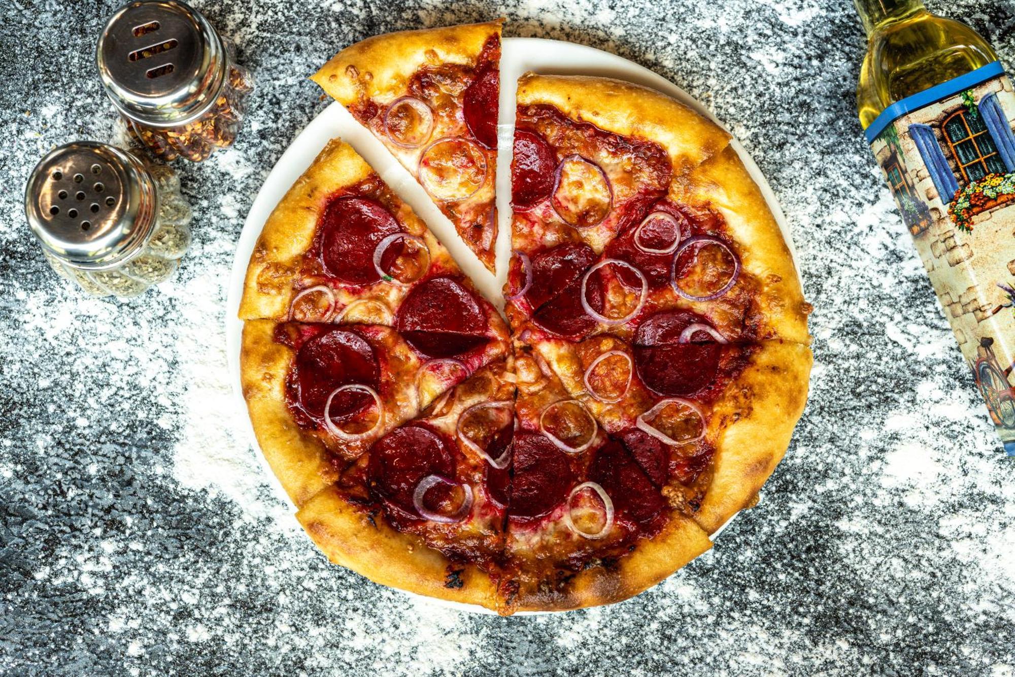 Hyatt Place Gurgaon Udyog Vihar Extérieur photo A pepperoni pizza